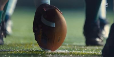 a close up of a football on a field