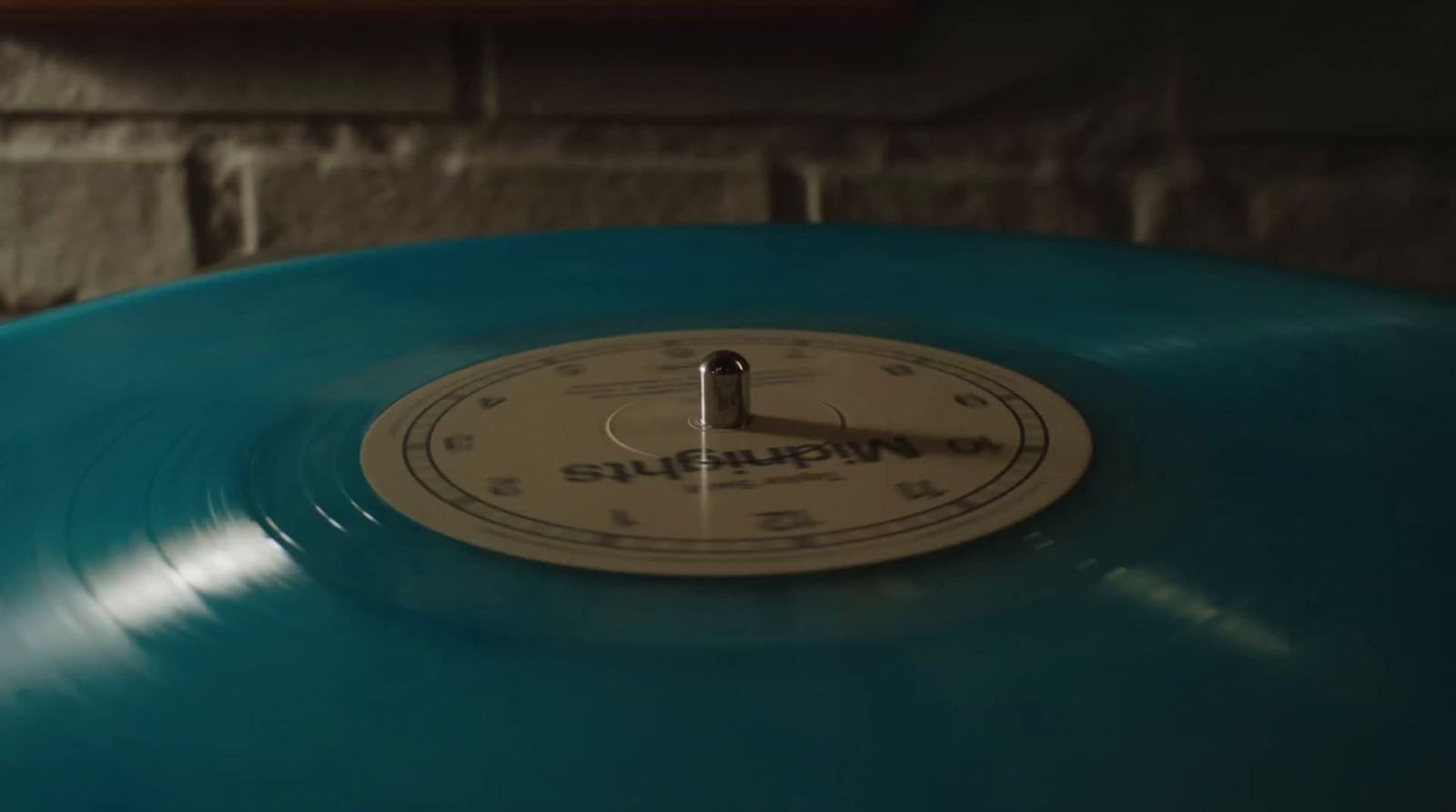 a close up of a blue record player