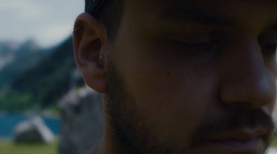 a close up of a person wearing a hat