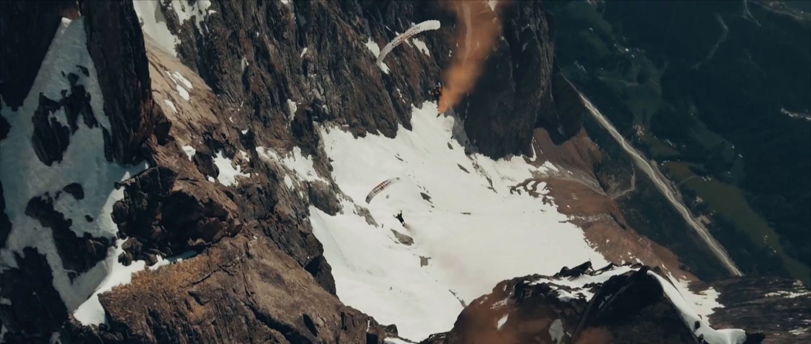 an aerial view of a snow covered mountain