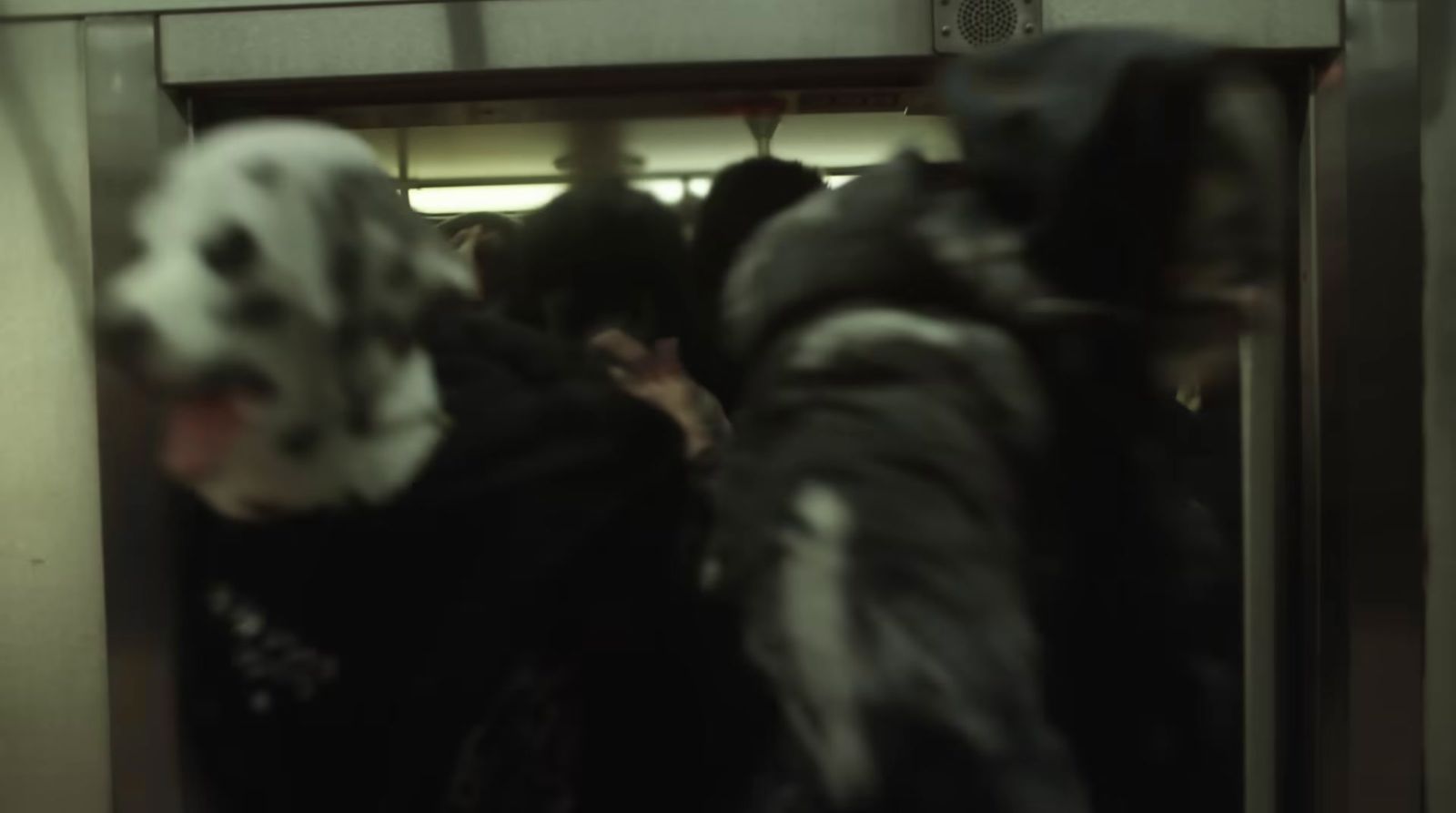 a group of people riding on a subway train