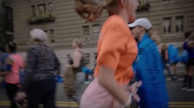 a group of people running in a marathon