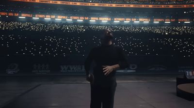 a man standing in front of an empty stadium