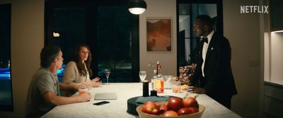 a group of people sitting around a table