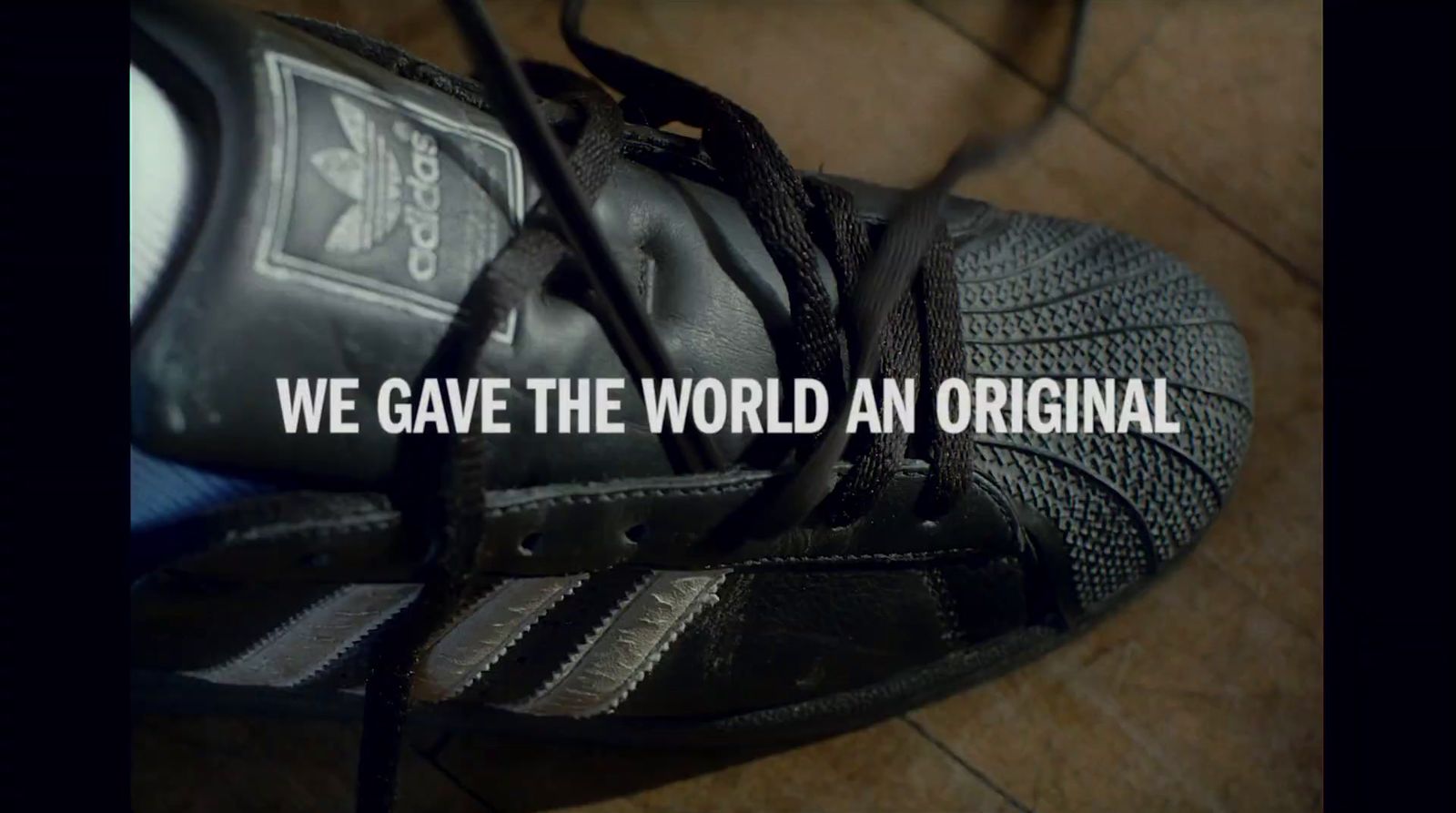 a pair of shoes with the words we gave the world an original