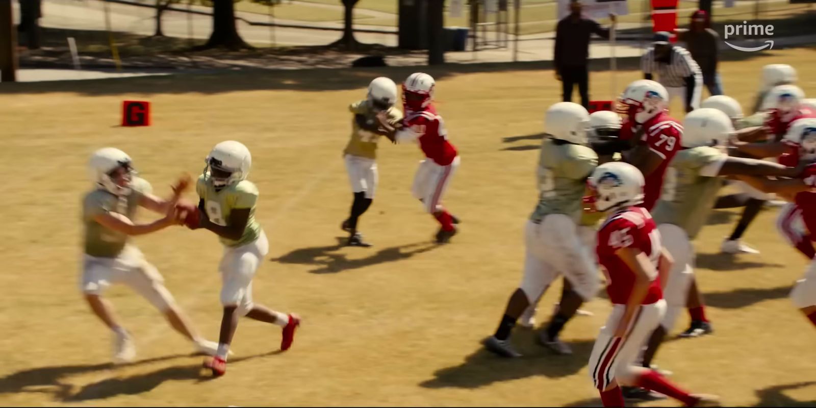 a group of young men playing a game of football