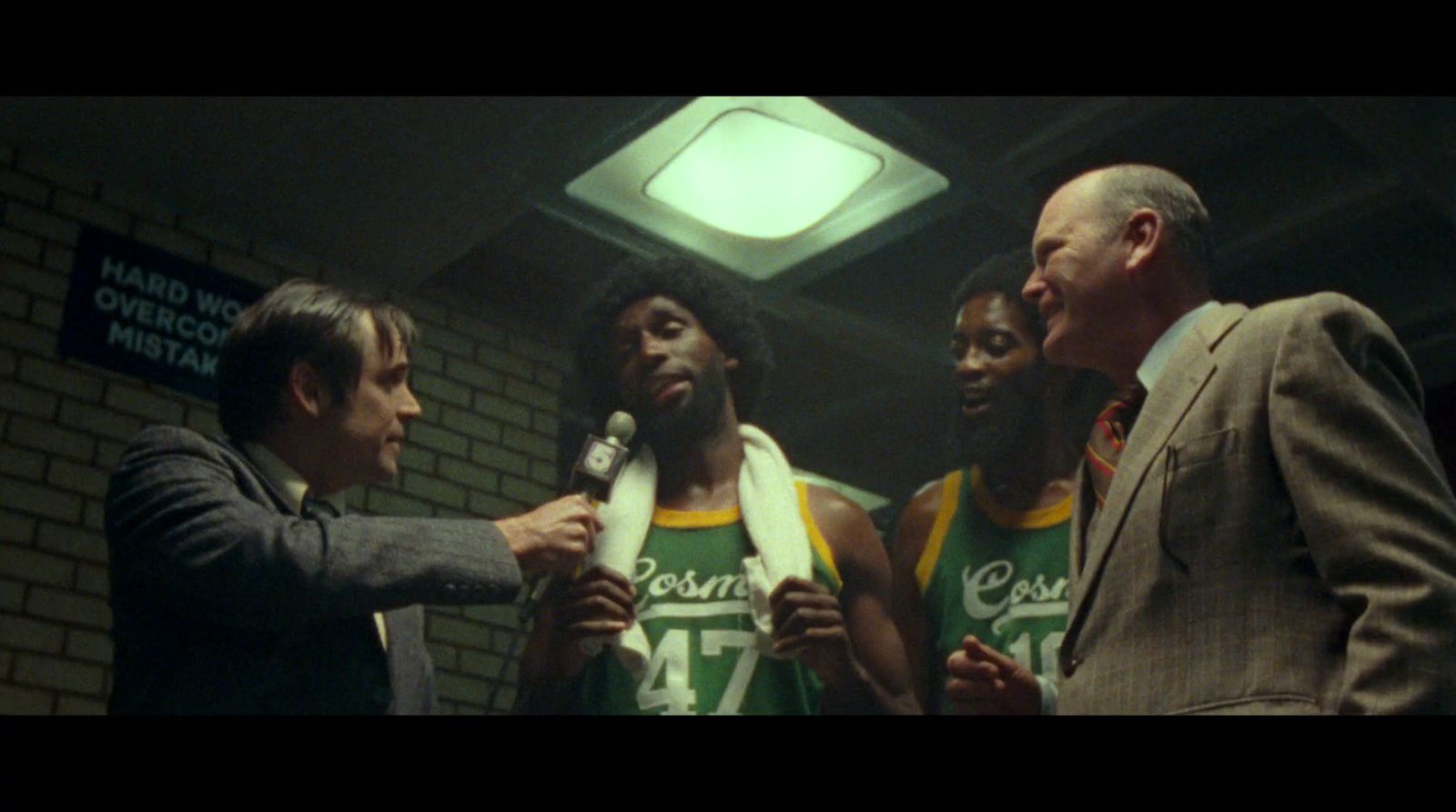 a group of men standing next to each other