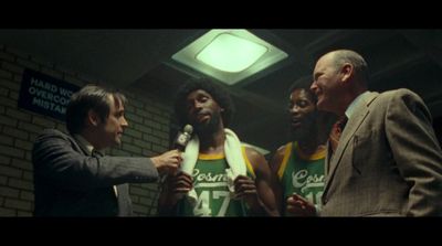 a group of men standing next to each other