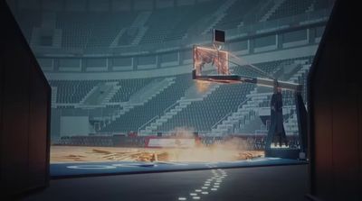 a basketball hoop in an empty basketball court