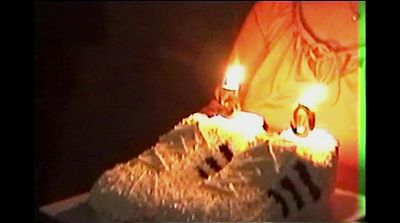 a close up of a cake with candles on it