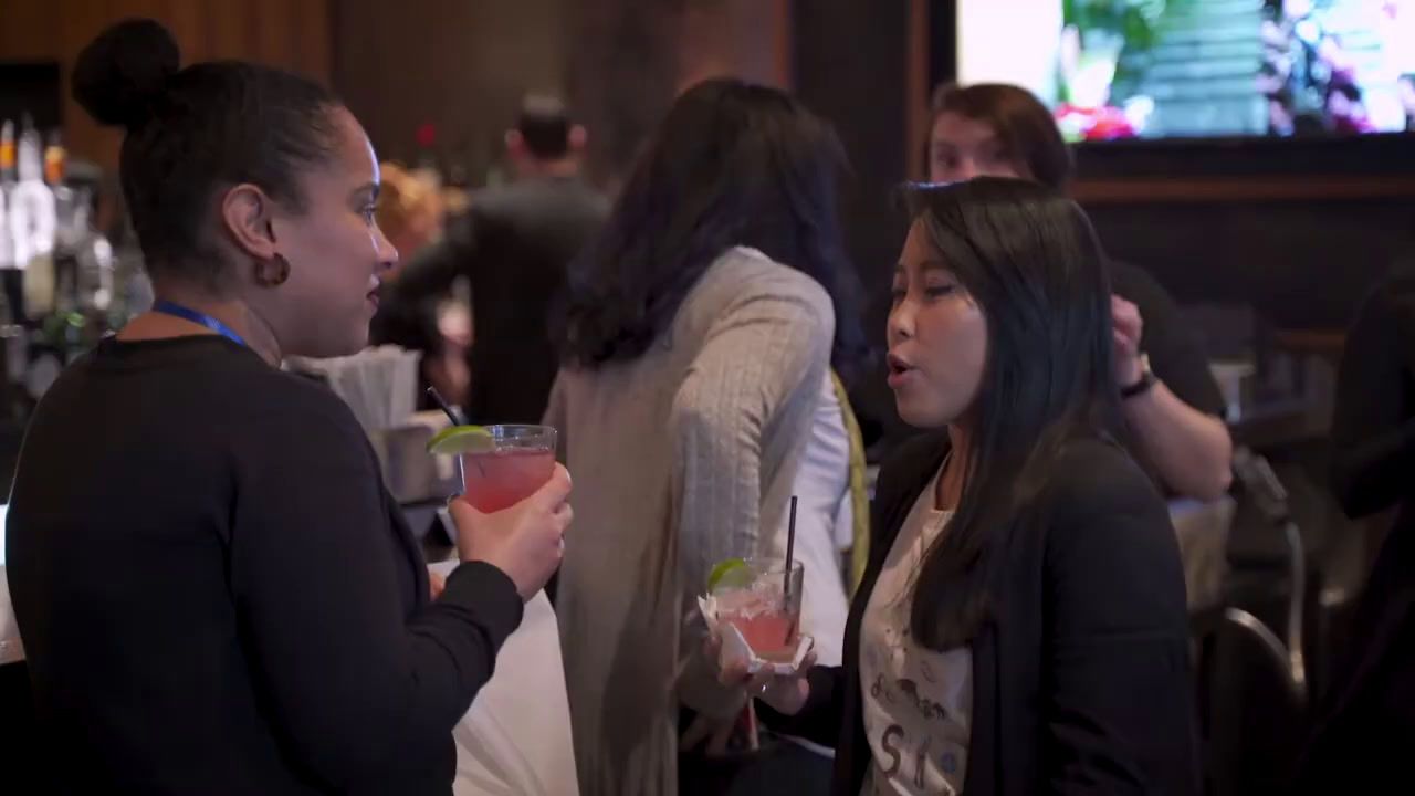 a couple of women standing next to each other