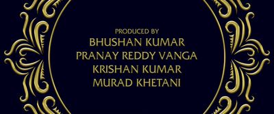 a black and gold frame with the words, produced by bhushan kumar