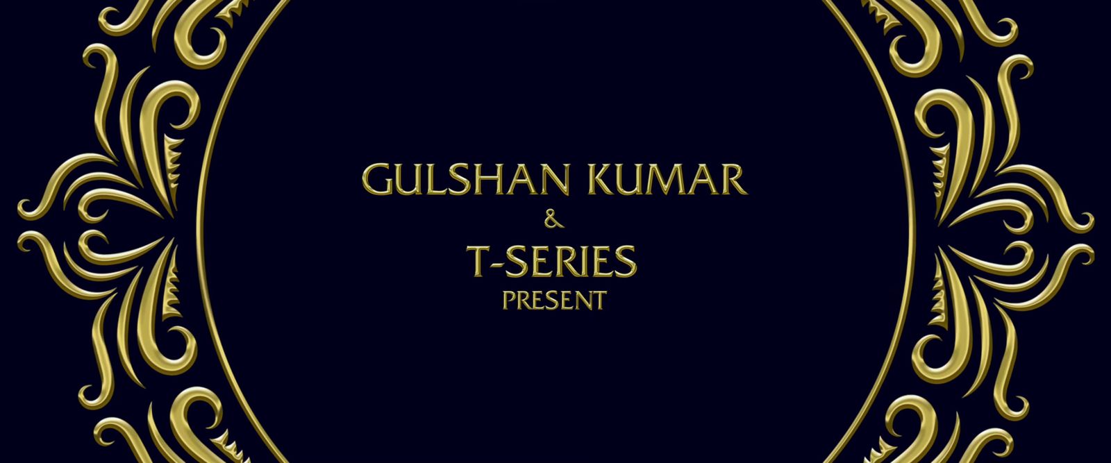 a black and gold frame with the words gulshan kumar and t -