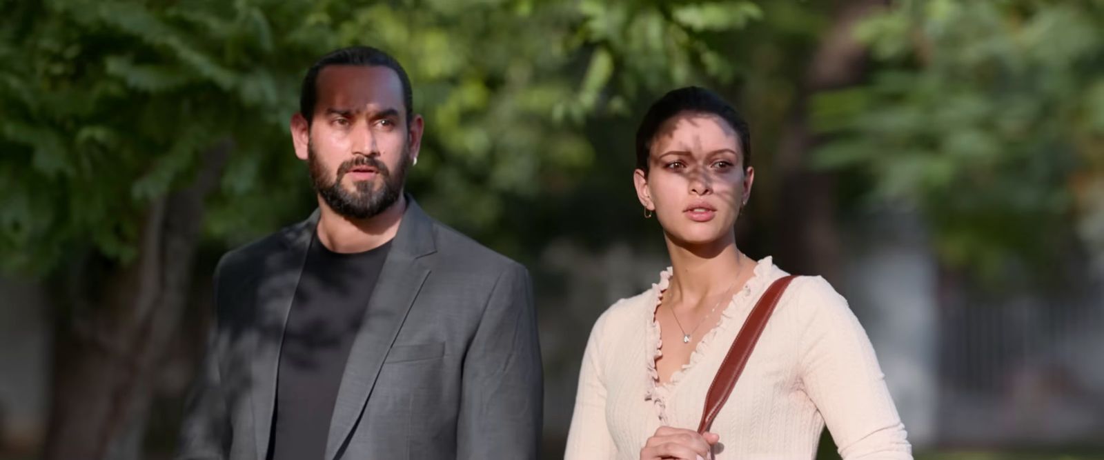 a man and a woman standing next to each other