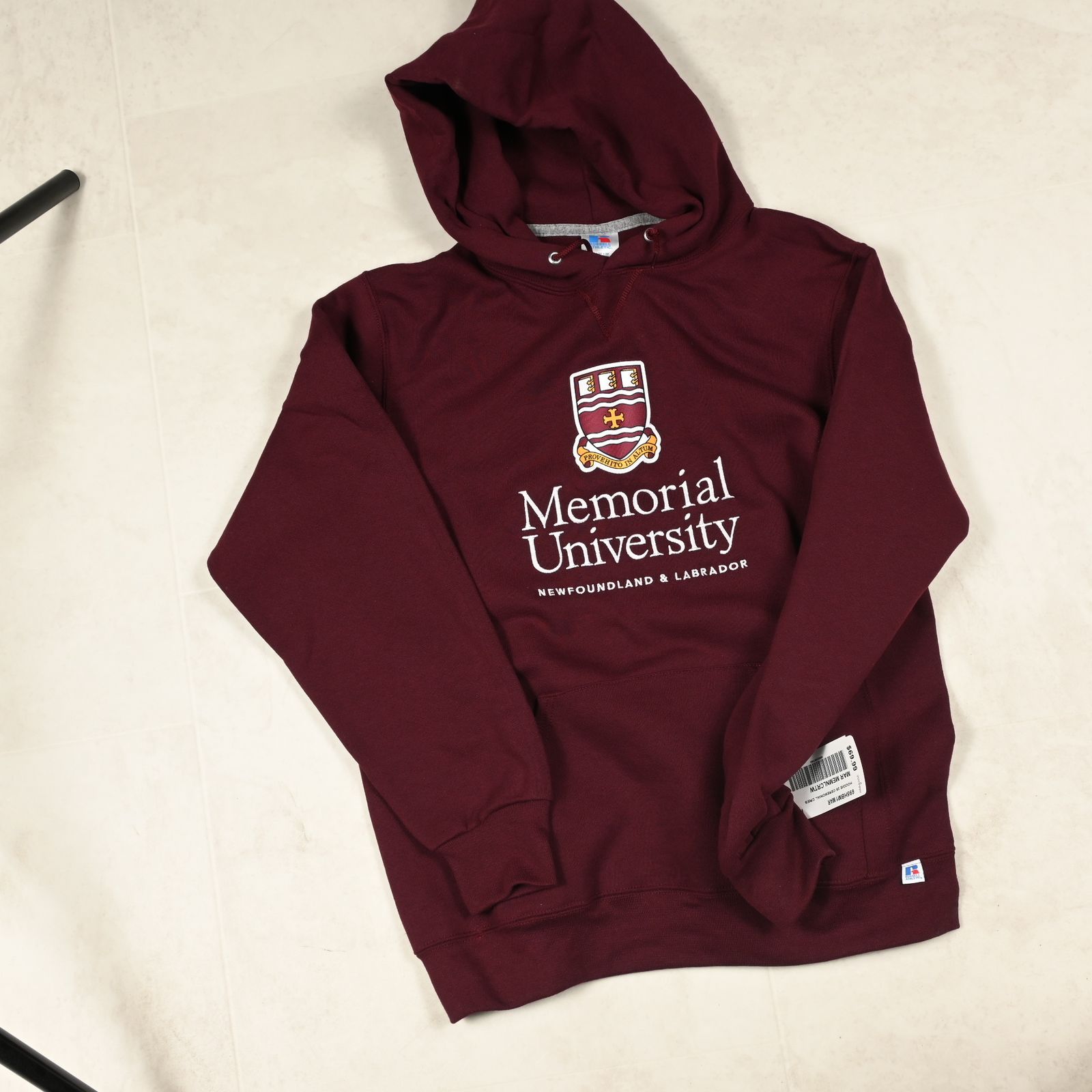 a maroon sweatshirt with the words memorial university on it