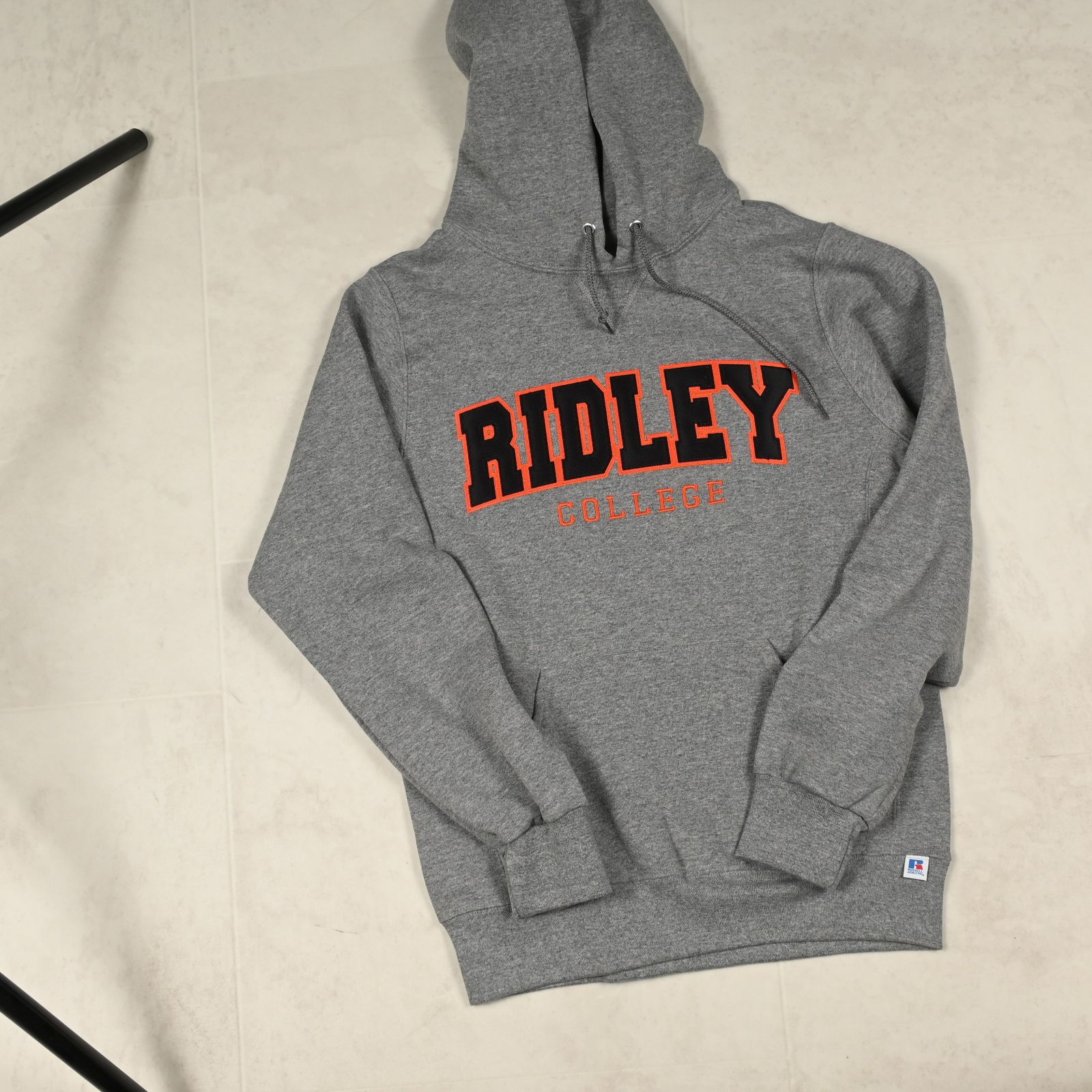 a grey hoodie with the word ridley on it