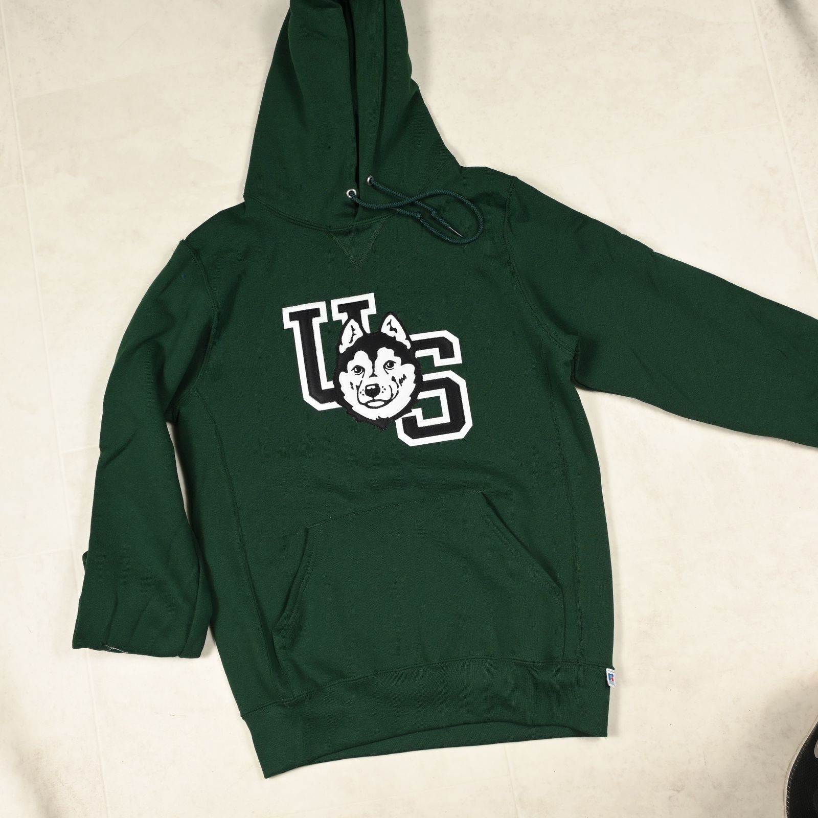 a green hoodie with a cat on it