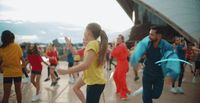 a group of young people dancing on a dance floor