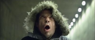 a man in a hooded jacket with his mouth open