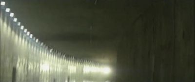 a blurry photo of a tunnel with lights