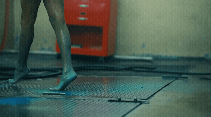 a woman's legs and legs are covered in water