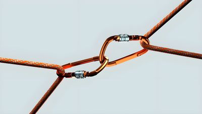 a close up of a metal object with a rope