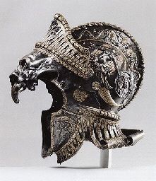 a silver helmet with a bird on it