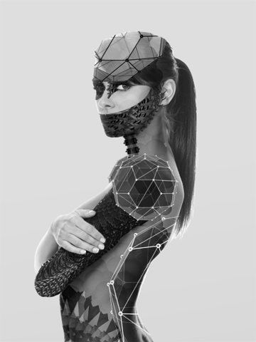 a woman in a body suit with a mask on