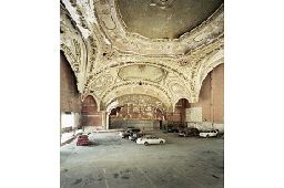 a large room with a ceiling that has a painting on it