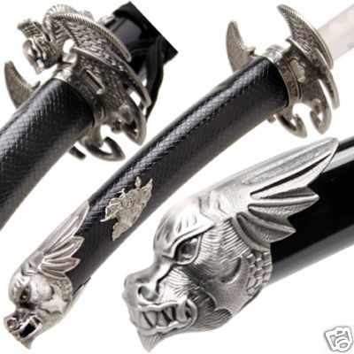 a sword with a dragon head on it