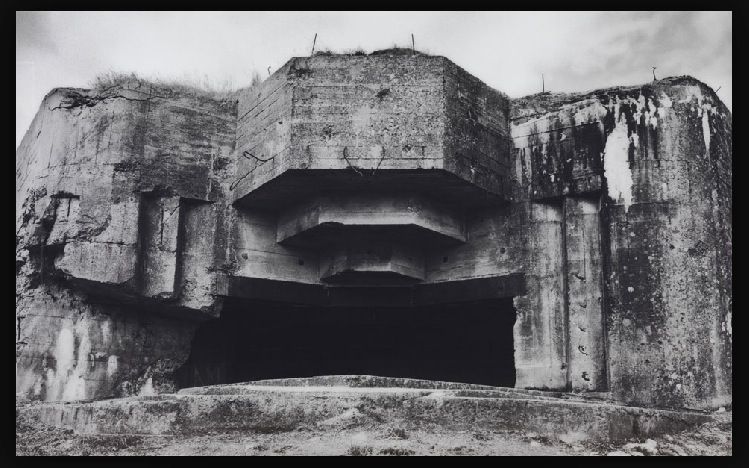 a black and white photo of a cave