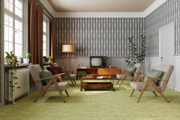 a living room filled with furniture and a tv