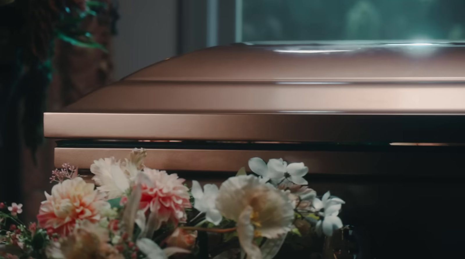 a bunch of flowers sitting on top of a stove