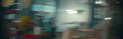 a blurry photo of a room with a chair