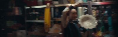 a blurry photo of a woman in a store