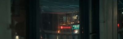 a blurry photo of a city street at night