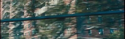 a reflection of a building in a window