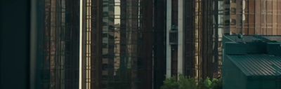 a tall building with a clock on the side of it