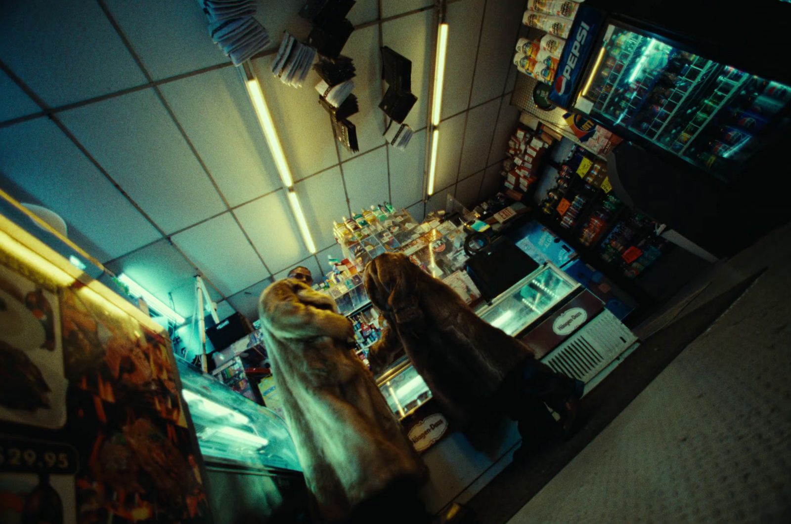 a woman in a fur coat standing in a store