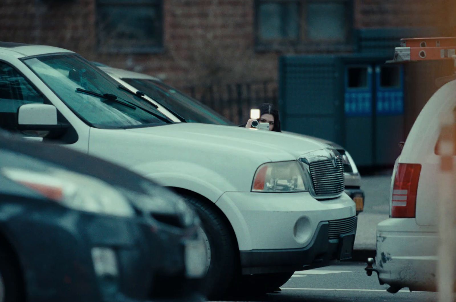 a white police car parked in a parking lot