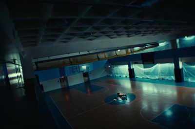 a basketball court with a basketball on the floor