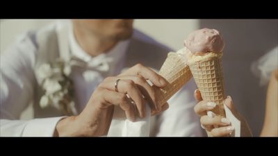 a couple of people that are eating some ice cream