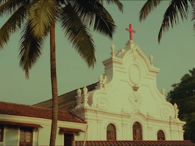 a church with a red cross on top of it