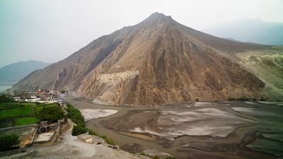 a mountain with a river running through it