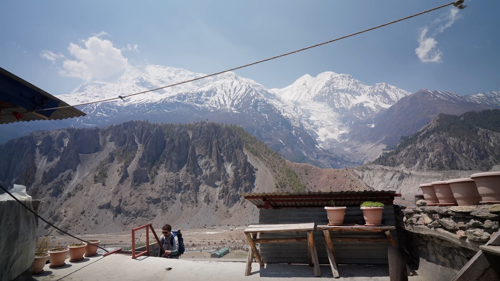 a view of a mountain range from a rooftop