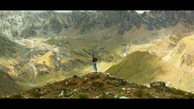 a person standing on top of a mountain