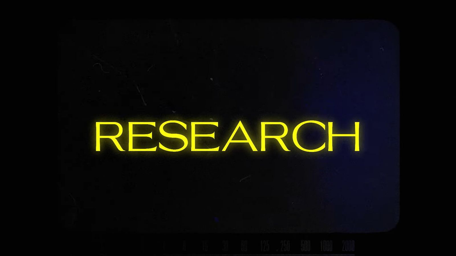 a neon sign that reads research on a black background