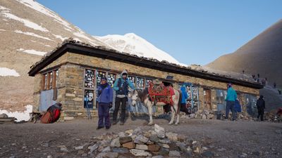 a group of people standing outside of a building