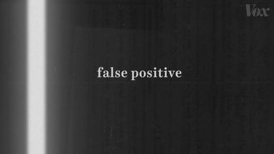 a black and white photo with the words false positive