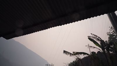 a view of the sky from inside a building